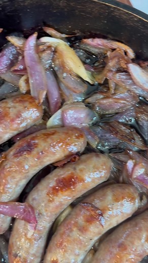 These Easy Oven Baked Brats with Roasted Onions comes together in about 30 minutes, for a delicious and mess-free way to make brats for dinner! Serve them on sandwiches, or with gravy and mashed potatoes! Grab the recipe at jawnsicooked.com #buzzfeedfood #wholefoods #cookinglight #thecookfeed #f52weeknight #epicurious #tastingtable #food52 #allrecipes #huffposttaste #bratwurst #onepanmeal #brats #sausages #easyrecipeideas