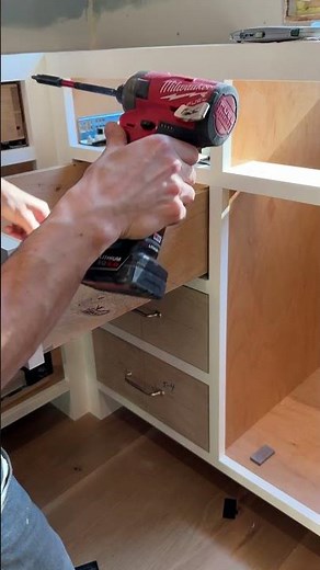 Installing drawer faces #woodshop #kitchencabinets