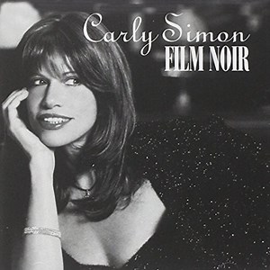On September 16, 1997, Arista Records released the Carly Simon album “Film Noir”, a celebration of the treasured songs in classic films. Today we’ll share a song from that album, Frank Loesser’s “Spring Will Be A Little Late This Year”, sung by Carly of course with our own Jimmy Webb. Carly and Jimmy wrote a special title song for the album, and Carly lit a fire under every gem and torch song found within. Carly Simon, Jimmy Webb and Arif Mardin produced, with Jimmy on piano, conducting and cont