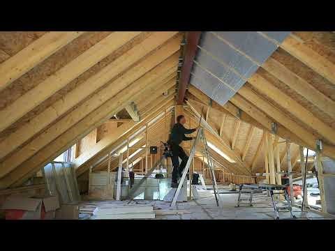 Fitting the pir insulation between the rafter part 4