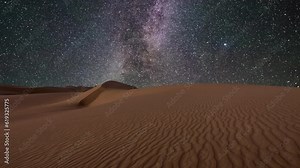 Amazing views of the desert under the night starry sky. Timelapse.
