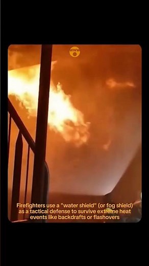 Firefighters using fog shield to survive backdrafts or flashovers