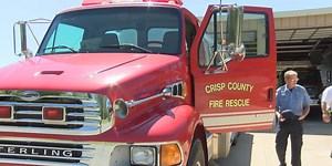 Crisp Co. sends two firefighters to help fight West Mims Fire
