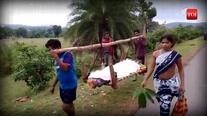 5.8K views · 89 reactions | Poverty-stricken family carries kin body on shoulders | The Times of India | Facebook