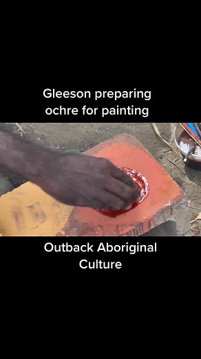 Grinding Ochre for Aboriginal Art in Australia