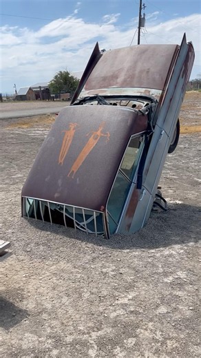 1963 Cadillac Sedan Deville buried in Cisco Utah.