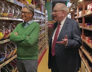 Warren Buffet and Bill Gates visit a candy store.