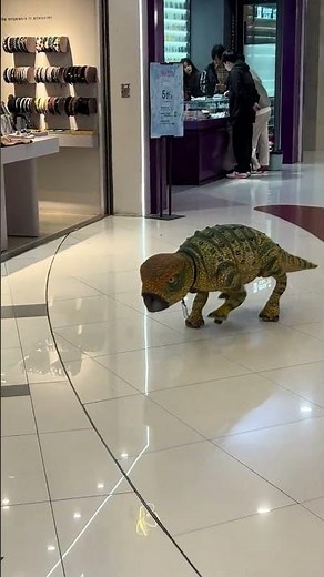 Energetic robotic dinosaur toy entertains in Shanghai, China