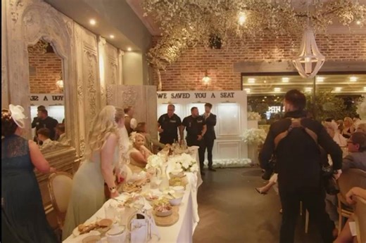 Bride shouts 'not on my wedding day' as 'police' storm party in search of dad