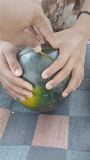 Gently pulling the sections outward to reveal the heart of the frui #allahﷻallahﷻ #colonelkkjϟ #love