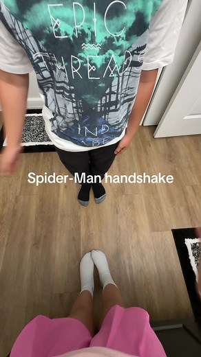 Spider-Man Handshake Trend with Cousin