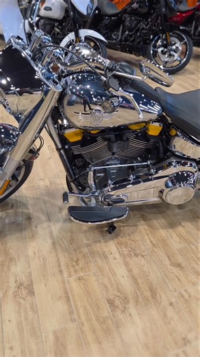 Today, we pay tribute to a legend — the Grey Ghost. When Willie G. Davidson first rolled out the Fat Boy in 1990, he built more than a motorcycle — he built an icon. The 2025 Grey Ghost honors that legacy with mirror-like chrome, solid disc wheels, and a winged tank badge that nods to the U.S. military’s aviation heritage. Underneath the shine lives the modern Milwaukee-Eight engine — refined, torquey, and built to move both body and soul. From the B-29 inspiration of its design to the beast it’