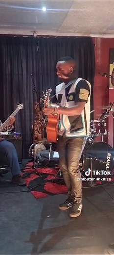 Live Music Performance Featuring Guitarist and Bassist