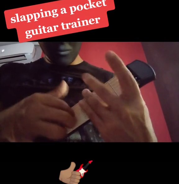 Slapping a Pocket Guitar Trainer