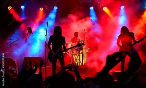 Rock Band Performing on Stage with Crowd