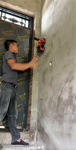 Installing a laser marking machine for construction wall installation and structural verification