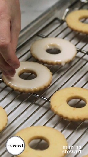 These festive wreath-shaped shortbread cookies are infused with Meyer lemon and adorned with sugared rosemary and thyme. Watch Molly make these adorable cookies and make them for Santa before Christmas with our recipe here: http://bit.ly/38AZQZ5 | Martha Stewart