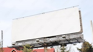 Empty large blank advertisement white billboard surface template, city street outdoors advertisement, copy space. Unused advertising space, ad missing, empty horizontal frame, border for replacement