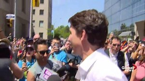 Justin Trudeau walks in Toronto’s Pride parade