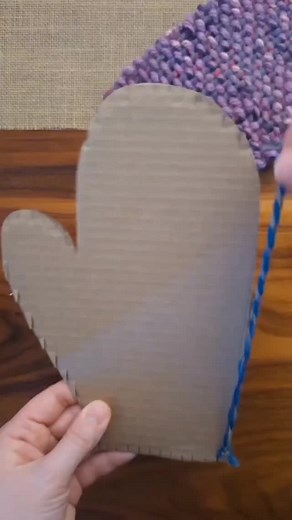 crafting corner on Instagram: "Cardboard Loom Woven Mittens ❄️ A nice snow day activity - using cardboard to create hand woven mittens! I cut notches around the top and bottom of a piece of cardboard cut into a mitten shape. Then I wrapped yarn around the cardboard and behind the tabs. I cut a popsicle stick on one end, just enough to split the wood, to hold the yarn for weaving. We used the popsicle stick to help guide the yarn while weaving. Once you are done weaving you can pull the yarn off 