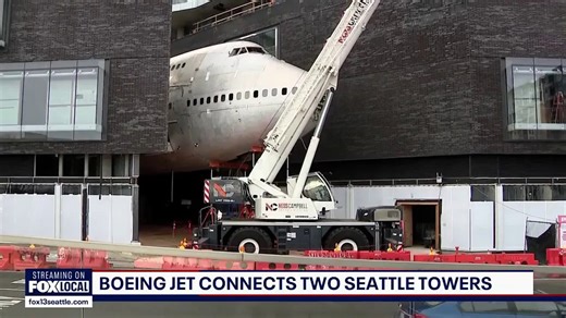 Decommissioned Boeing jet installed between two Seattle towers