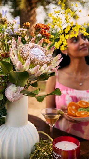 Interflora India on Instagram: "Scenes Around the Table — Part 3 This wasn’t just a table — it was a mood in itself. Seasonal florals, fresh palettes, and layered accents came together to create an atmosphere where time lingered and stories unfolded. sculptural florals, seasonal palettes, luxury hosting, textures & details, editorial tablescape, mood & atmosphere, gatherings redefined"