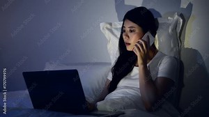 woman using computer at late night