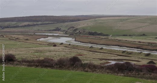 Early morning Long shot of the seven sisters County Park with the Cuckmere river.