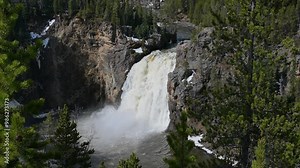Upper Falls of the Yellowstone River in Yellowstone National Park. The falls mark the beginning of the Grand Canyon of Yellowstone. Camera is locked. With sound.