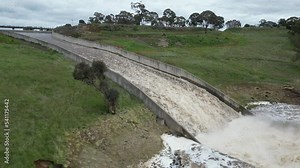 Lake Eppalock dam spillway overflowing into the Campaspe River near Bendigo