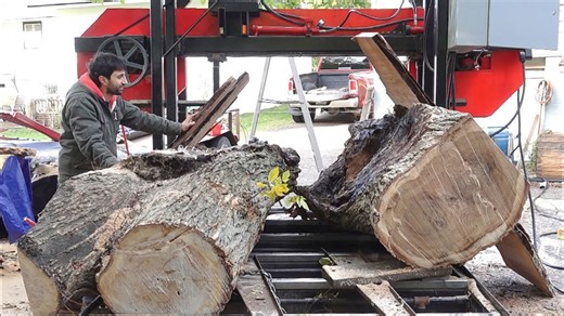 Watch this log split at my sawmill