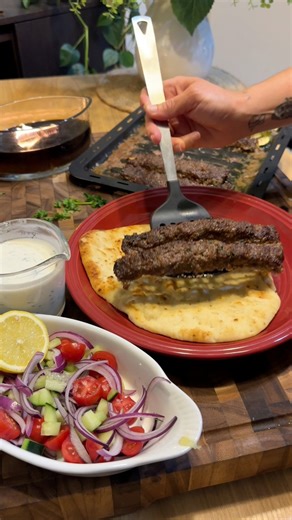 Air Fryer Beef Kebabs Ingredients: • 1 lb ground beef • 1 onion, grated and juices squeezed out • ¼ cup fresh parsley, chopped • 3 cloves garlic, minced • 1 tbsp Cavender’s Greek seasoning • Onions, tomatoes, and cucumbers for serving • Tzatziki sauce for dipping Instructions: 1. In a mixing bowl, combine the ground beef, grated onion (with liquid squeezed out), parsley, garlic, and Cavender’s seasoning. 2. Mix thoroughly until everything is well combined. 3. Press the mixture evenly into your a