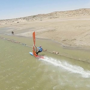 Can you believe this drone managed to battle through 50 knot winds to keep up with Bjorn Dunkerbeck at 98.53kph?! 👏 | Red Bull Adventure