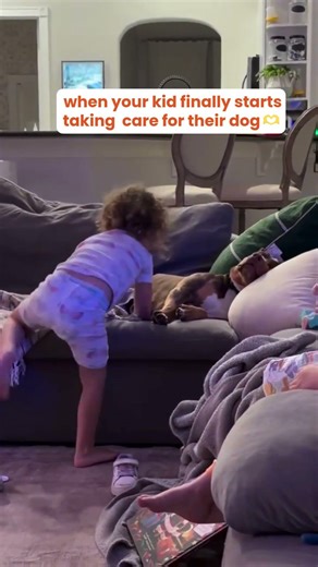 A baby taking care of a baby!