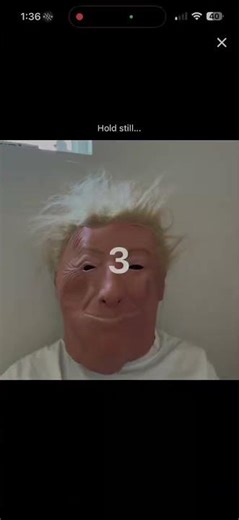Trying to bypass Roblox AI age verification with a rubber mask