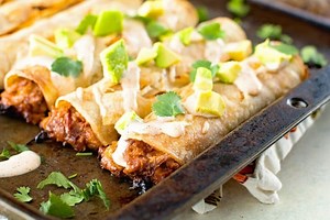 Pulled pork taquitos dipped in Chipotle Ranch Dressing!