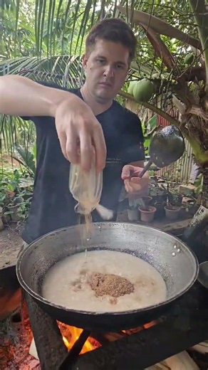 Cooking a giant swamp taro or locally called palaw/paw.