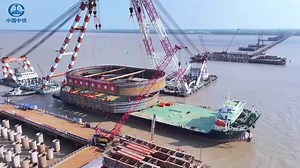 With the successful placement of the massive steel cofferdam, the Chongqi Yangtze River Railway Bridge has formally entered a new construction phase. The Railway Bridge, built by #CREC, is the world's largest double-pylon double-cable-plane ballastless-track #cablestayed bridge. This bridge is a crucial connection along the #Shanghai, #Nanjing, and #Hefei high-speed rail routes. Spanning a total length of 4.09km, the railway bridge has a dual-level design for both road and rail. The upper level 