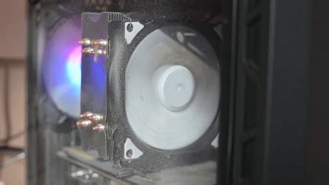 clip-4007153735-close-dusty-rgb-computer-cooling-fan-assembled