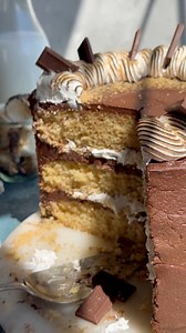 Ultimate S’mores Cake! Fluffy & moist graham cracker flavored cake layers are filled with homemade marshmallow fluff & frosted in milk chocolate frosting! #smores #layercake #summerready #cakestagram | Blue Bowl