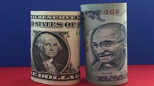 Rupee edges higher vs US dollar but not far from record low - CNBC TV18