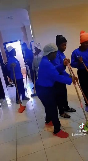 Team Cleaning Efforts in Colorful Uniforms