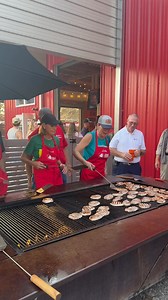 At the Iowa Pork Tent with Secretary Brooke Rollins and Secretary Mike Naig practicing our pork flipping skills! | Governor Kim Reynolds