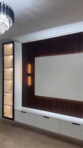 Tv unit with storage cabinets | Media wall ideas in dubai #mediawalll #mediawalluae #mediawalldubai #tvunit #tvpaneldubai #tvconsoleideas #dubai #uaelife #uae #dubaiinteriors #HomeDecorDubai #viral For more ideas visit: https://instylea.com/ | Instylea