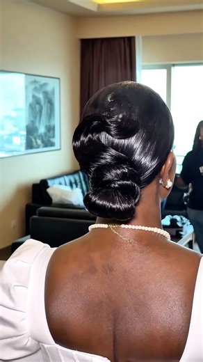 Lagos Hairstylist | Frontal & Lace Wig Specialist on Instagram: "My beautiful bride Dami on her blessed day of becoming Mrs Adeleke 💕💕💕 You know it can only be @beautybyadefunkeee on the lace melt, we opted for a cute bun with some drama and it’s just was the best look on my stunning bride 🥰🥰🥰 Hair: @adefunkeee Makeup: @revysbeauty Stylist: @theperlaco Wedding dress: @ Event planner: @bankysuevents"