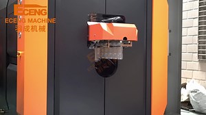 The machine works by using a process called blow molding, where a heated plastic tube (known as a preform or parison) is inflated with air, causing it to expand and take the shape of the mold. Once the plastic has cooled and hardened, the mold is opened and the bottle is ejected, ready for trimming and final inspection. Features of such machines may include high efficiency, energy saving, easy operation, high output with low rejection rate, and long service life. They may also come with advanced