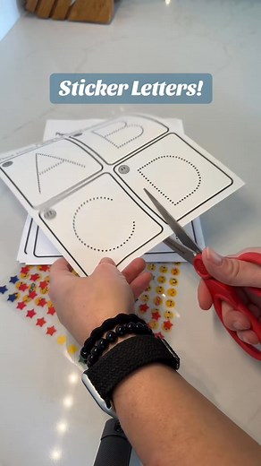 21K views · 242 reactions | Sticker letters—still going strong a year later! ✏️✨ After our sticker shapes went viral last fall, I added sticker-letter outlines to the writing center—and they’ve been a favorite ever since. Kids fill the letter with stickers, then trace the bumpy outline for extra fine-motor practice. If you haven’t grabbed them yet, the templates have been on preschoolvibes.com for a whole year—go check them out! | Preschool Vibes | Facebook