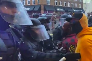 Pro-police protesters turn on cops during Oregon march, stamping on a blue-lines flag and shouting "f--k the blue"