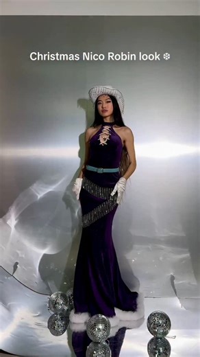 Nemo aka Nemsko ♥️ on Instagram: "Nico Robin reimagined for the holidays!! 🪩🤠 #nicorobin #cosplay #onepiece #holidaylook #anime"