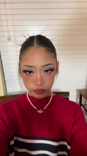 Stylish Indoor Fashion: Red Sweater Inspiration